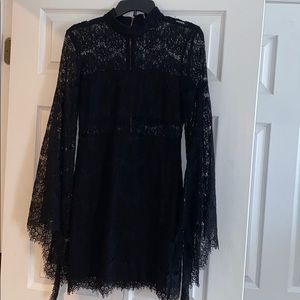 Lulus. Black lace dress. Bell sleeves. Sz M.
